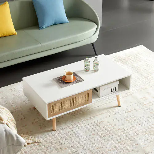 41.34" Rattan Coffee Table with Sliding Door Storage with Solid Wood Legs